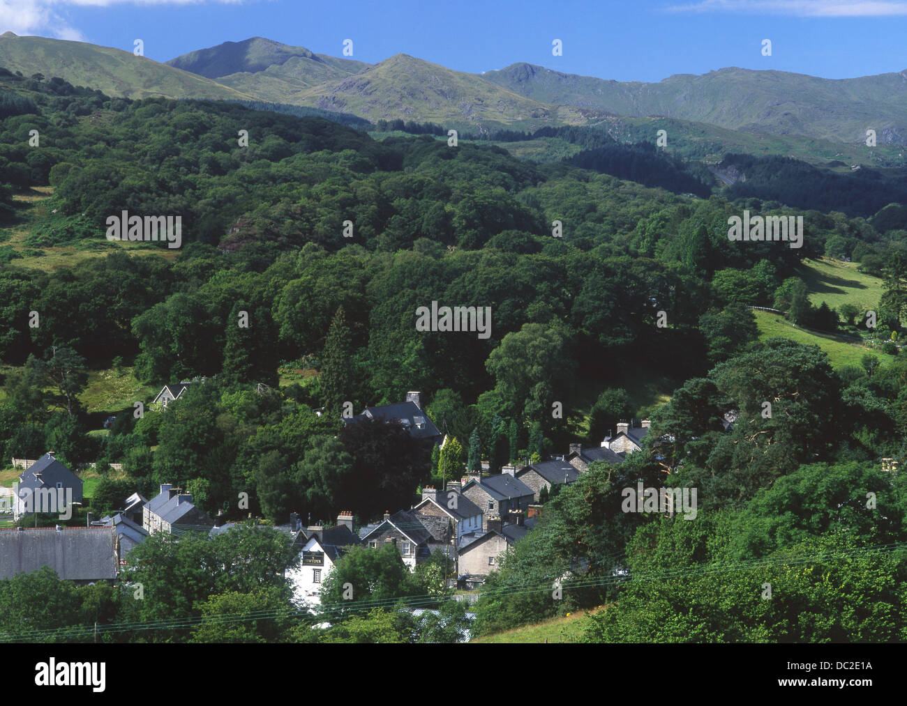 Dolwyddelan village in summer with mountains in distance Conwy County Snowdonia National Park North Wales UK Stock Photo