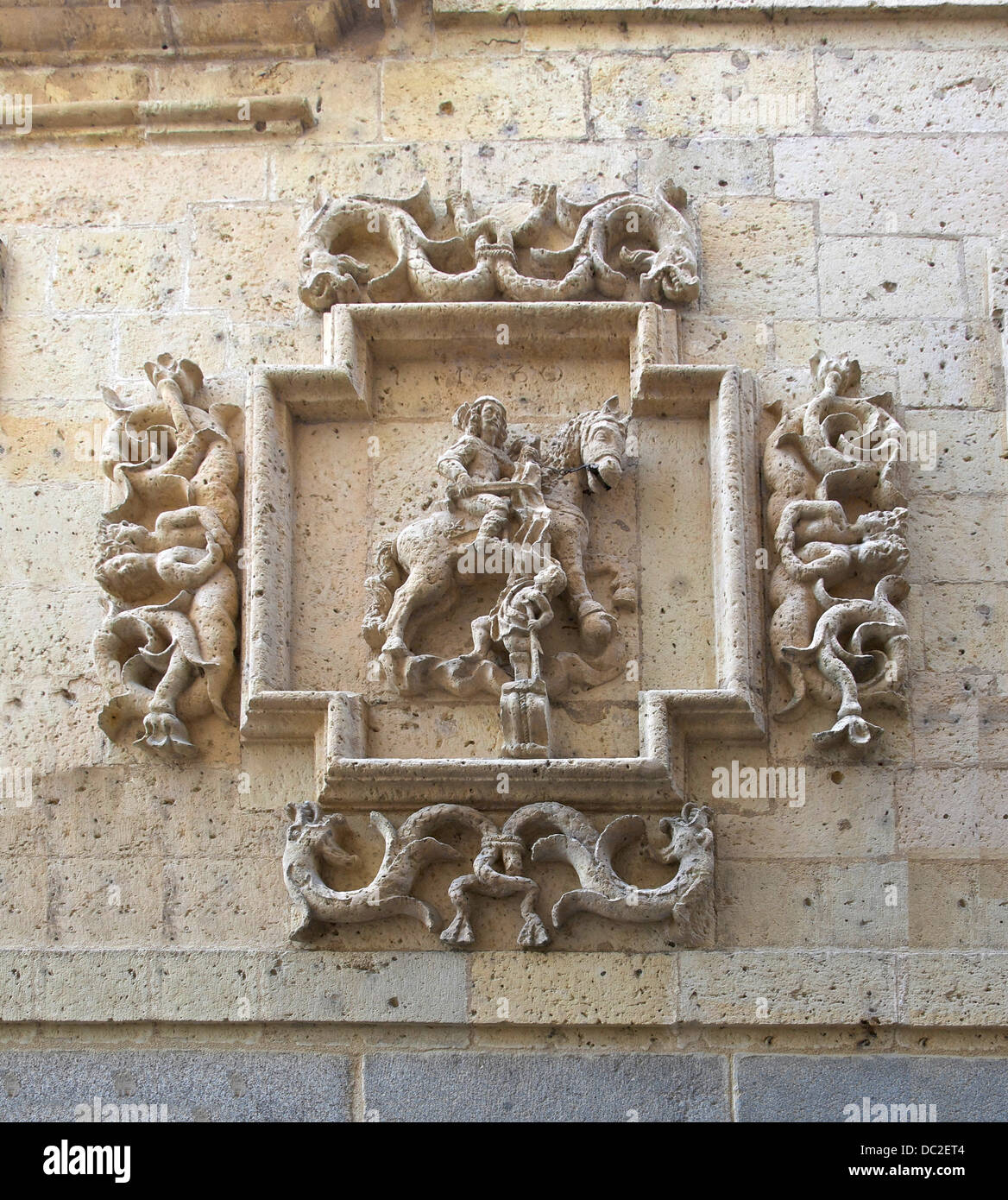Saint Martin and the beggar, relief, 1630, Church of San Martin, Segovia, Spain. Stock Photo