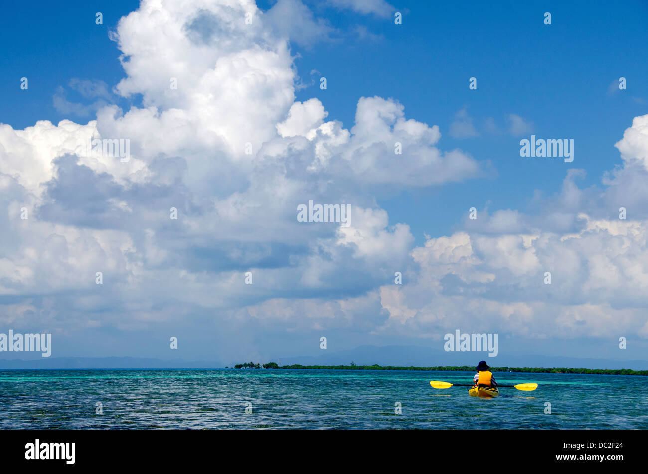 Belize, Caribbean Sea, Stann Creek, Southwater Cay. Kayaking around the barrier reef off the coast of Southwater Cay. UNESCO. Stock Photo