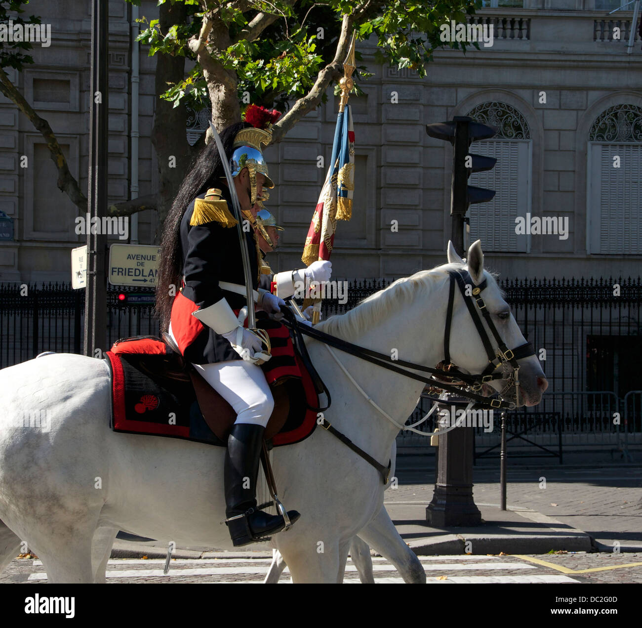 The standard of the cavalry regiment of the Garde Républicaine and his guard. Stock Photo