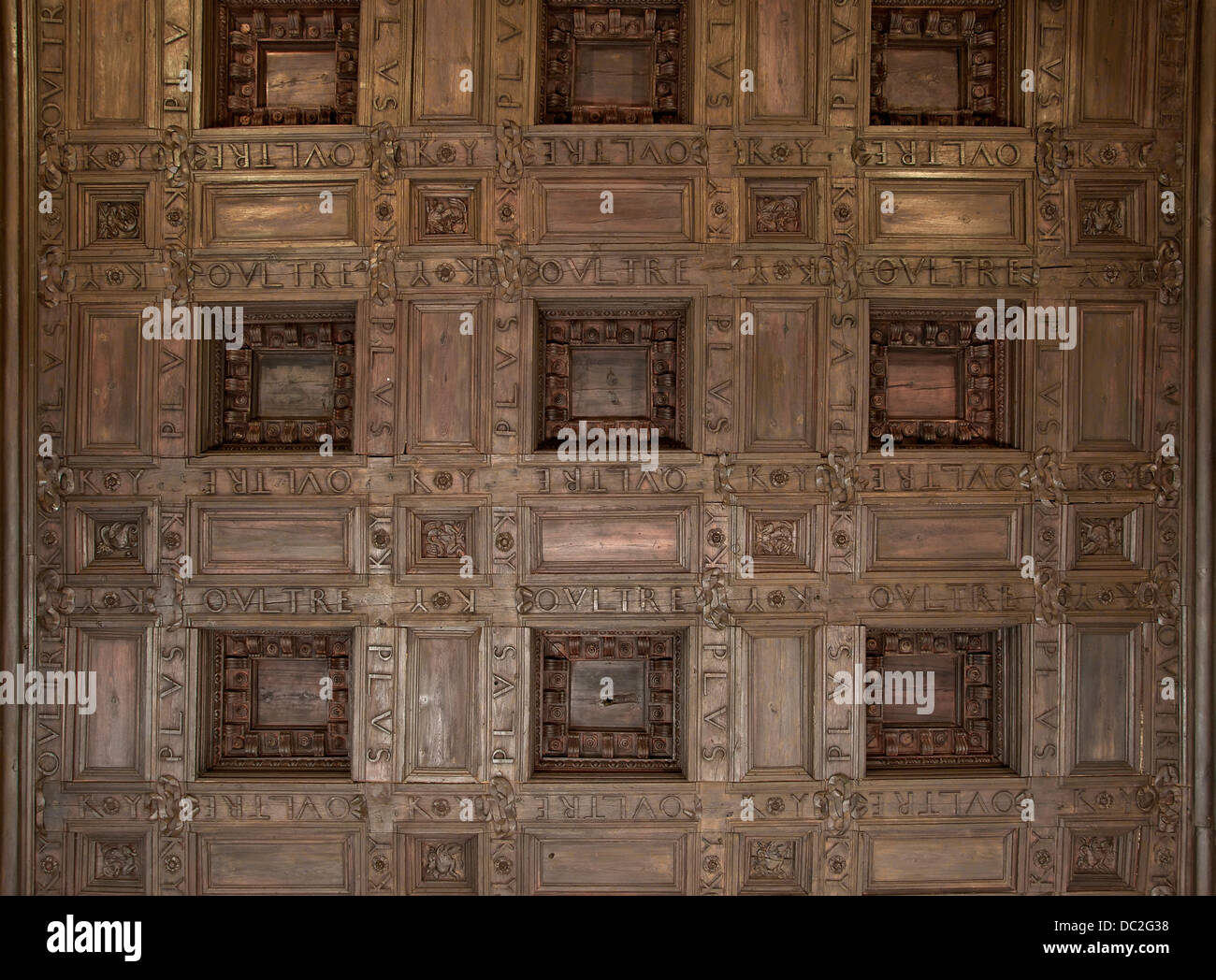 Part of a coffered wooden ceiling in the 'Emperors Chamber' of Alhambra of Granada, Spain. It shows the motto 'Plus Oultre' of Stock Photo