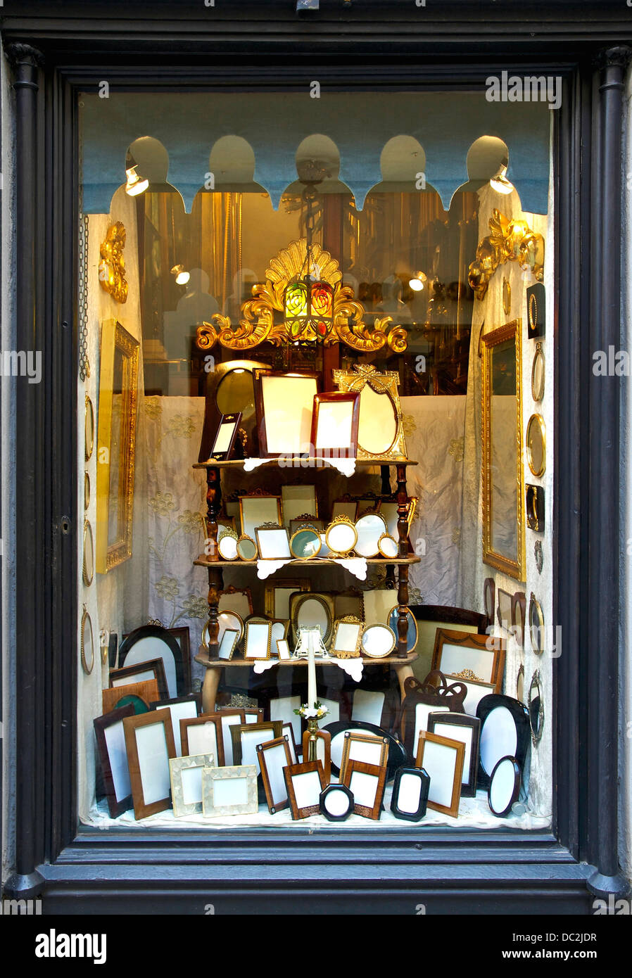The window of a picture frames shop. Vienna, Austria. Stock Photo