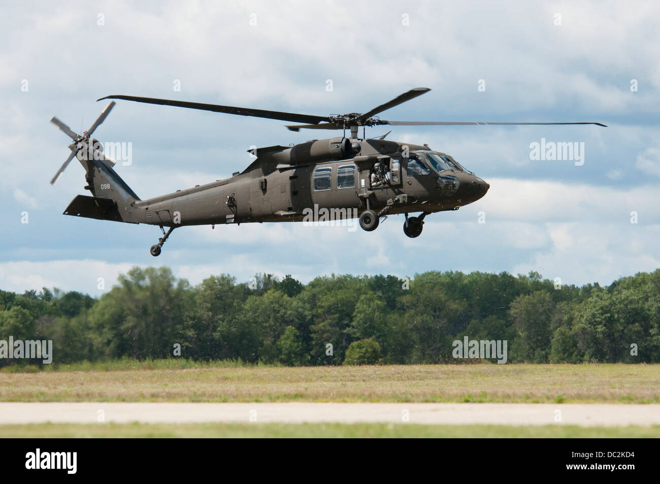 UH-60M Black Hawks from the 3-238 General Support Aviation Battalion from Grand Ledge, Michigan lands at Grayling Air Field, Grayling, Michigan, Aug. 3, 2013. The 3-238th are participating in Exercise Northern Strike 2013 a joint multinational combined ar Stock Photo