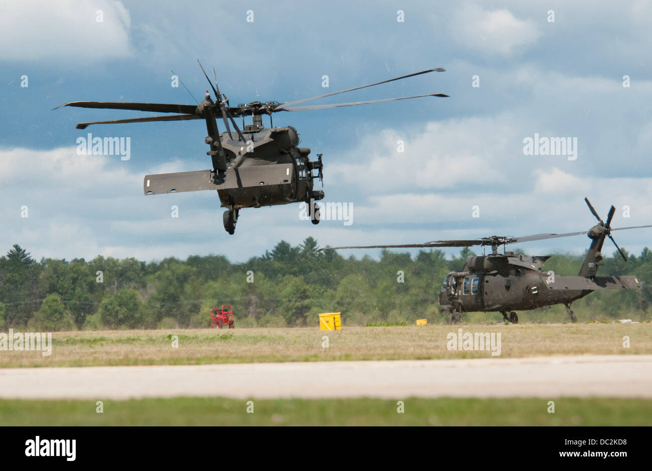 UH-60M Black Hawks from the 3-238 General Support Aviation Battalion from Grand Ledge, Michigan lands at Grayling Air Field, Grayling, Michigan, Aug. 3, 2013. The 3-238th are participating in Exercise Northern Strike 2013 a joint multinational combined ar Stock Photo
