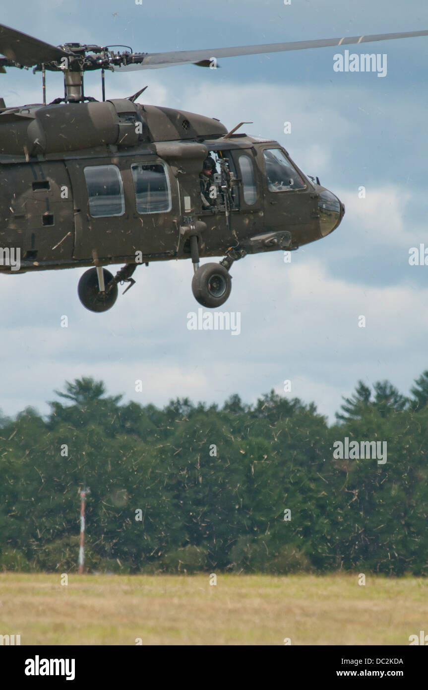 UH-60M Black Hawks from the 3-238 General Support Aviation Battalion from Grand Ledge, Michigan lands at Grayling Air Field, Grayling, Michigan, Aug. 3, 2013. The 3-238th are participating in Exercise Northern Strike 2013 a joint multinational combined ar Stock Photo