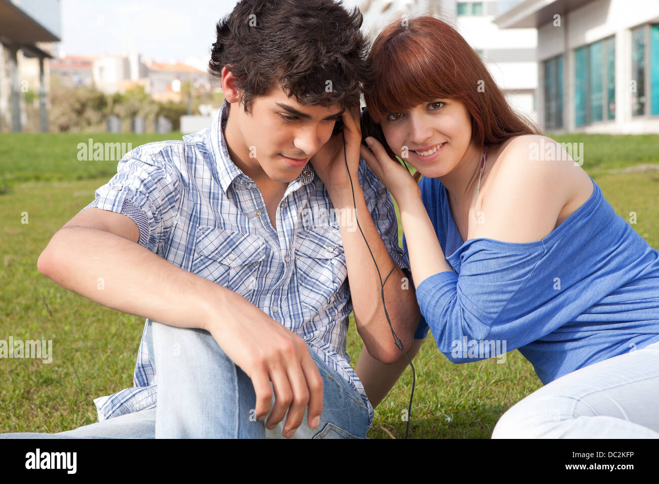 Young happy couple at the park Stock Photo - Alamy