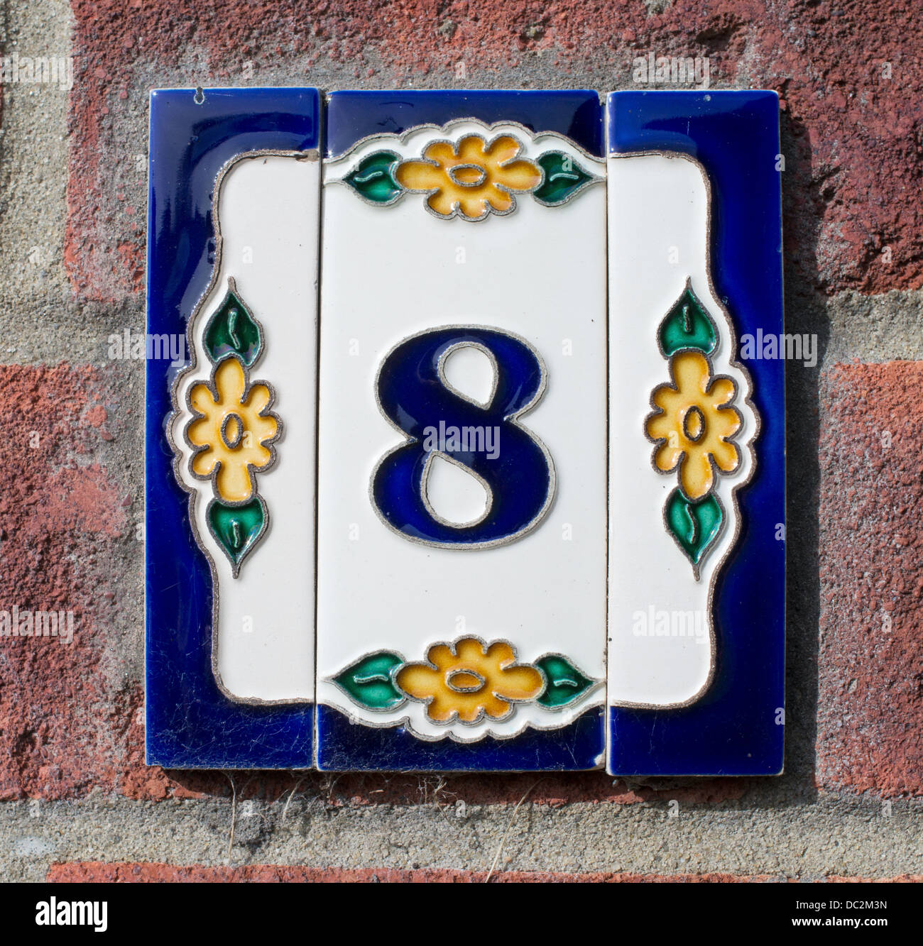 Ceramic tile house number eight 8 Stock Photo