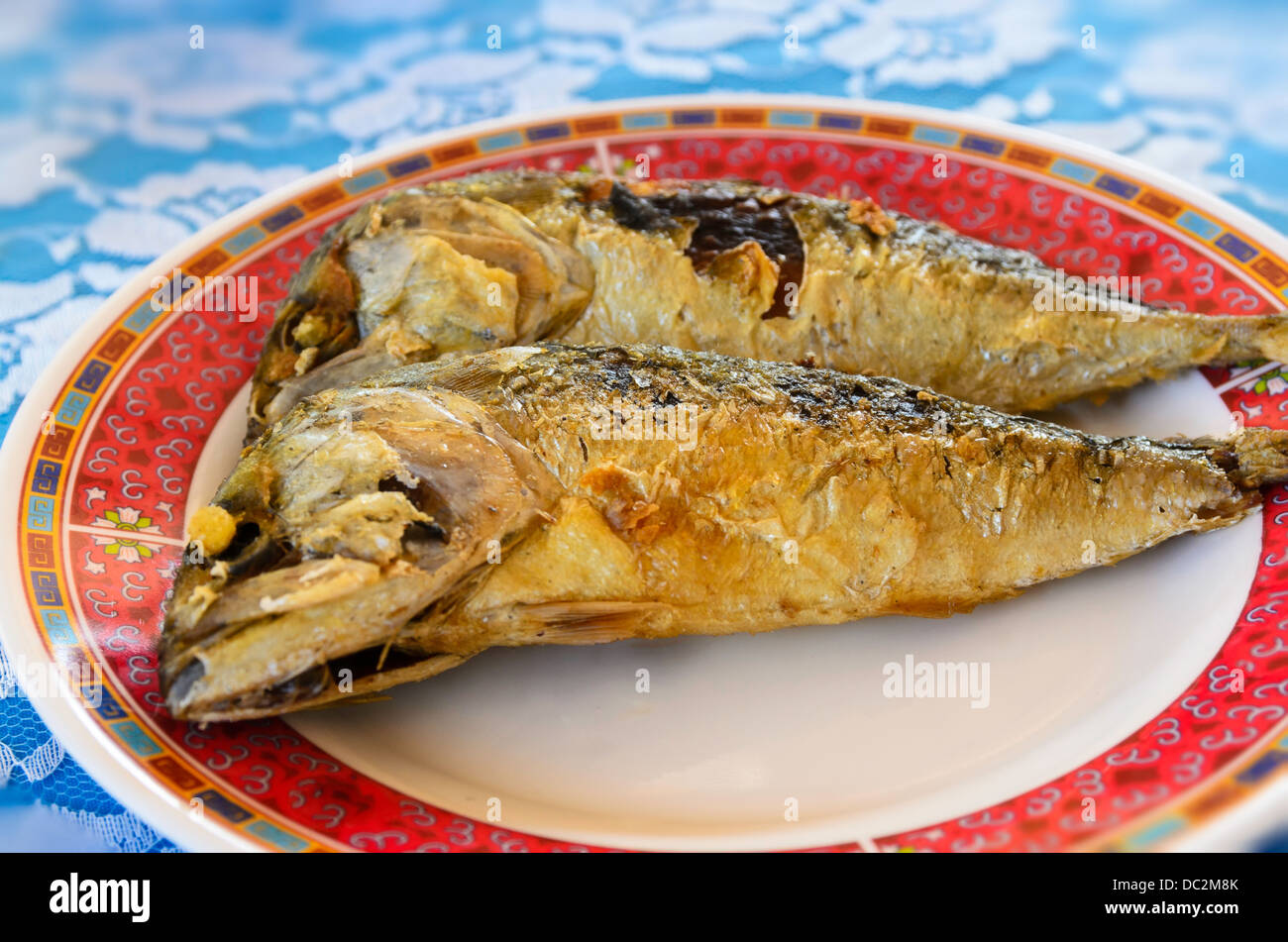Mackerel on a plate in the restaurant Stock Photo Alamy