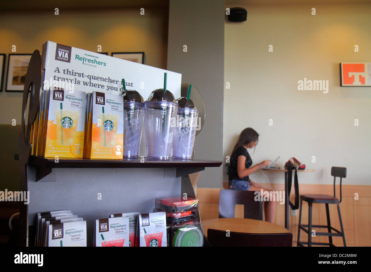 Florida Sunrise,Fort Ft. Lauderdale,Starbucks Coffee,barista,interior inside,customer,Internet access,wifi,looking FL130731132 Stock Photo