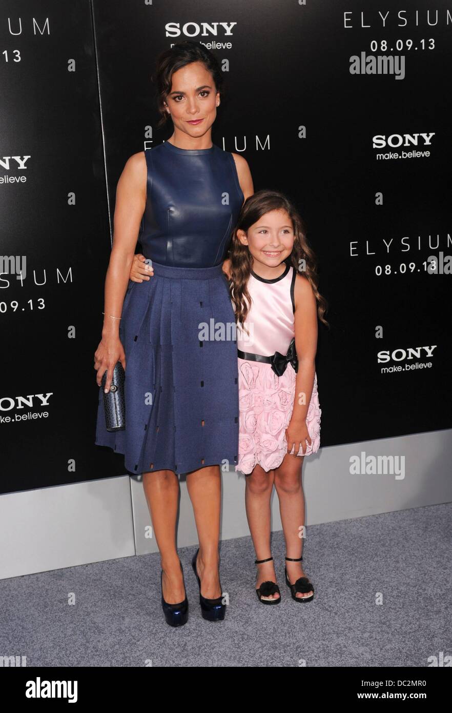 Los Angeles, CA. 7th Aug, 2013. Alice Braga, Emma Tremblay at arrivals for ELYSIUM Premiere, Regency Village Theatre, Los Angeles, CA August 7, 2013. Credit:  Elizabeth Goodenough/Everett Collection/Alamy Live News Stock Photo