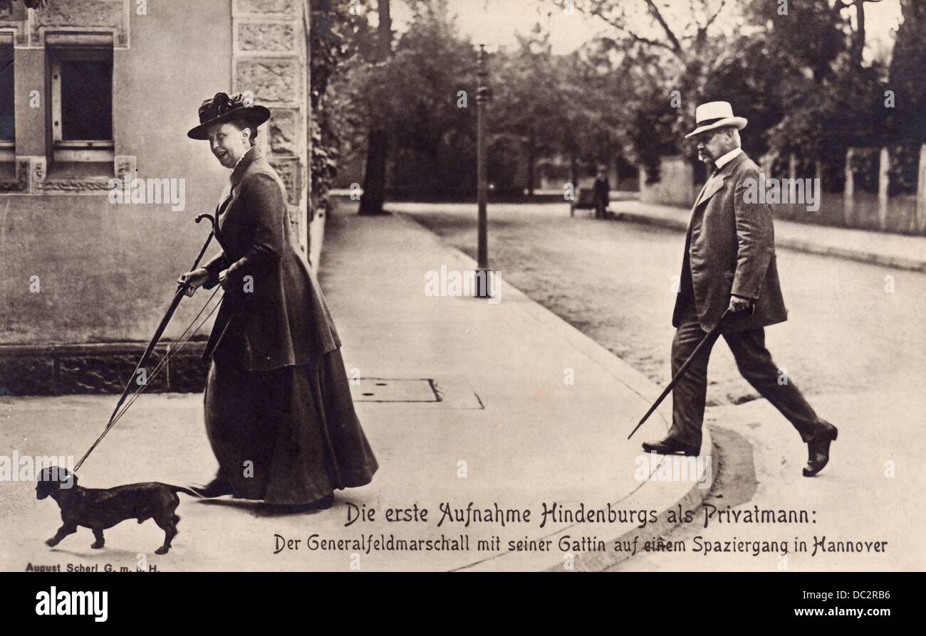 A contemporary postcard depicts the former Field Marshal and Chief of the General Staff Paul von Hindenburg and his wife Gertrud von Hindenburg as they walk their dog through Hanover, Germany. Date unknown (Hindenburg was retired between 1919 and 1925). Fotoarchiv für Zeitgeschichte Stock Photo