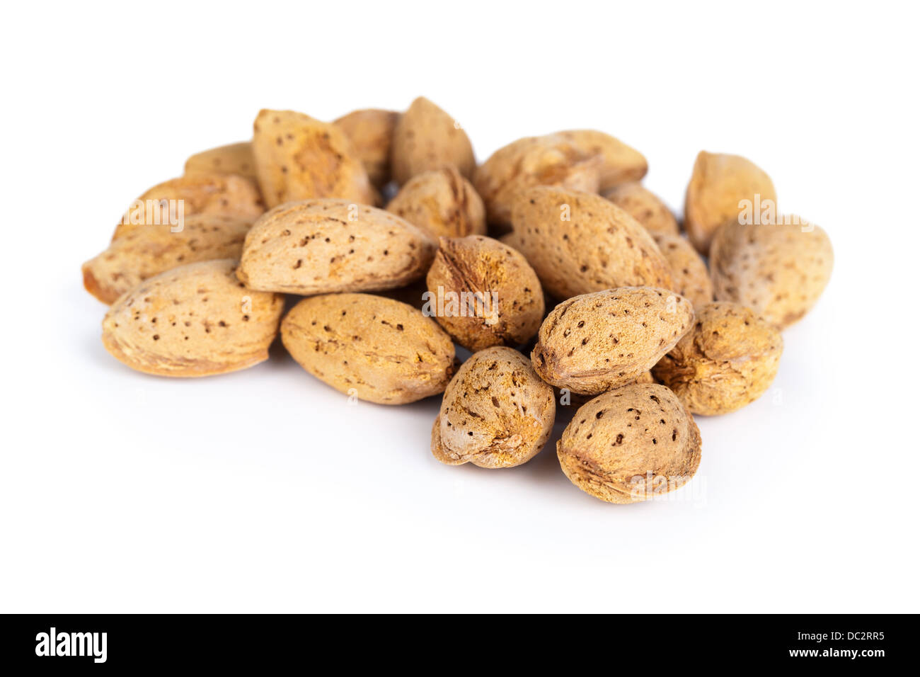 Almond nuts on white background. Macro shot Stock Photo