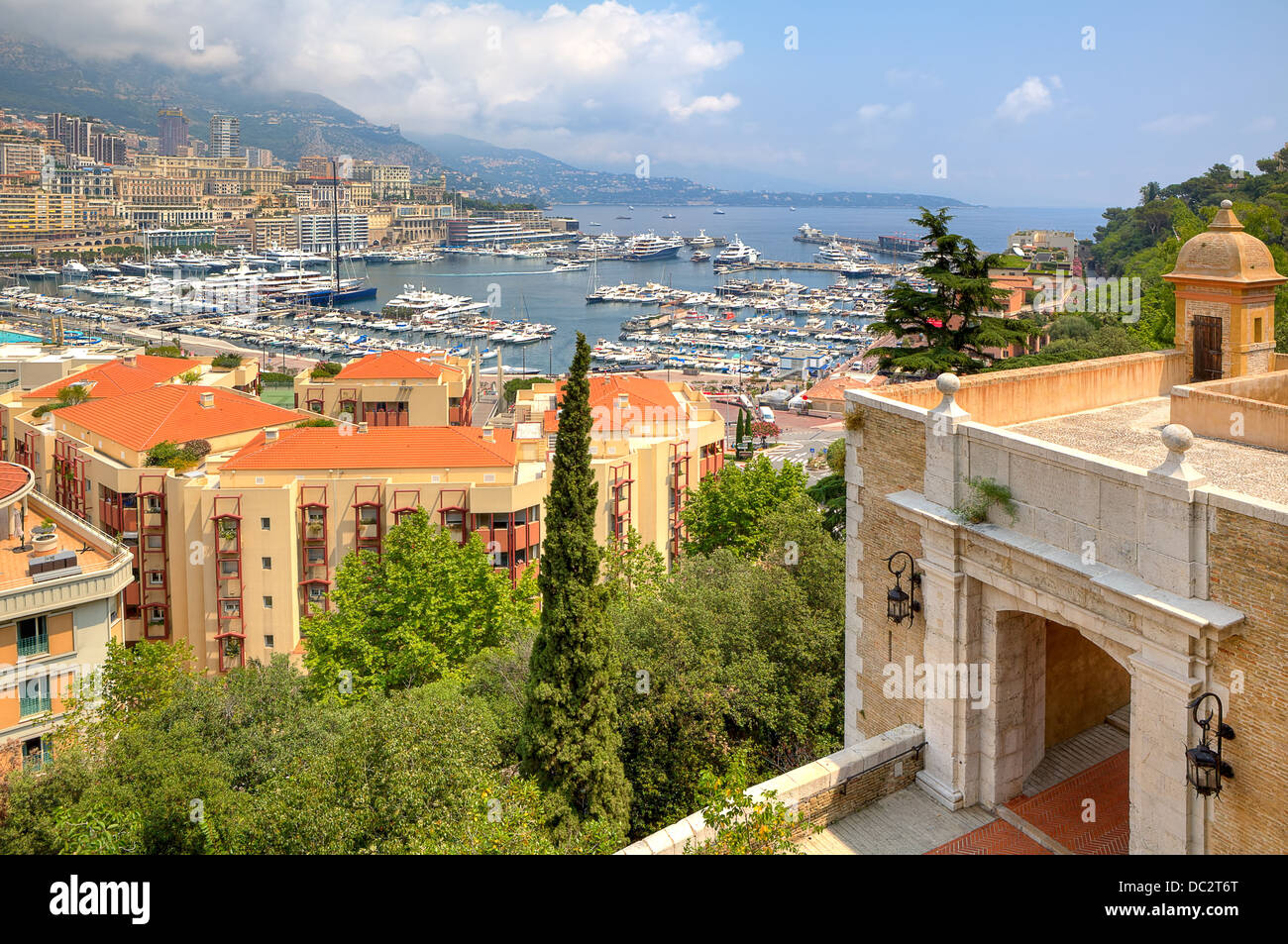 Beautiful view from ancient fortifications on port with yachts of Monte Carlo and residential buildings in Monaco. Stock Photo