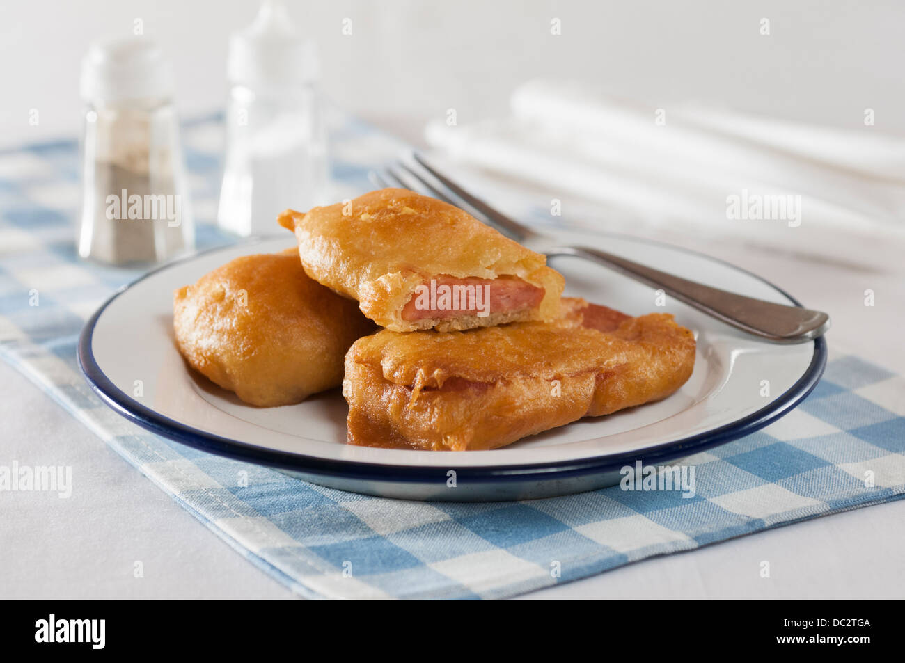 Spam fritters. Processed pork meat deep fried in batter. Stock Photo