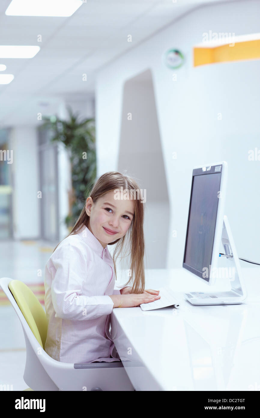 a girl using a PC Stock Photo - Alamy