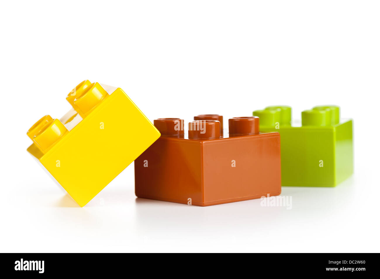 Plastic toy blocks on white background. Group of building blocks Stock Photo