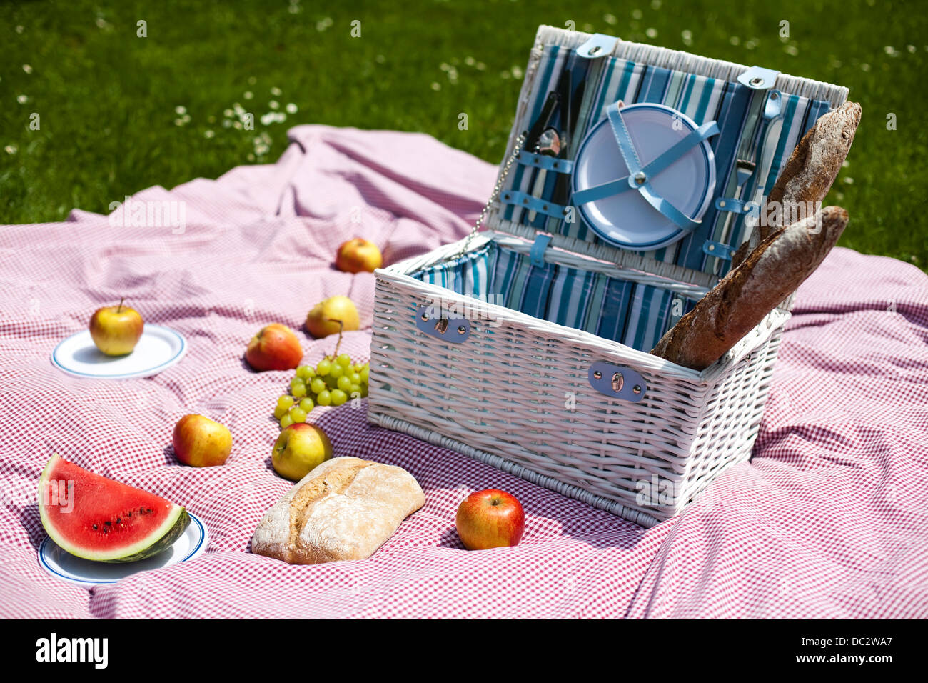Picnic basket with fruit bread and wine Stock Photo - Alamy