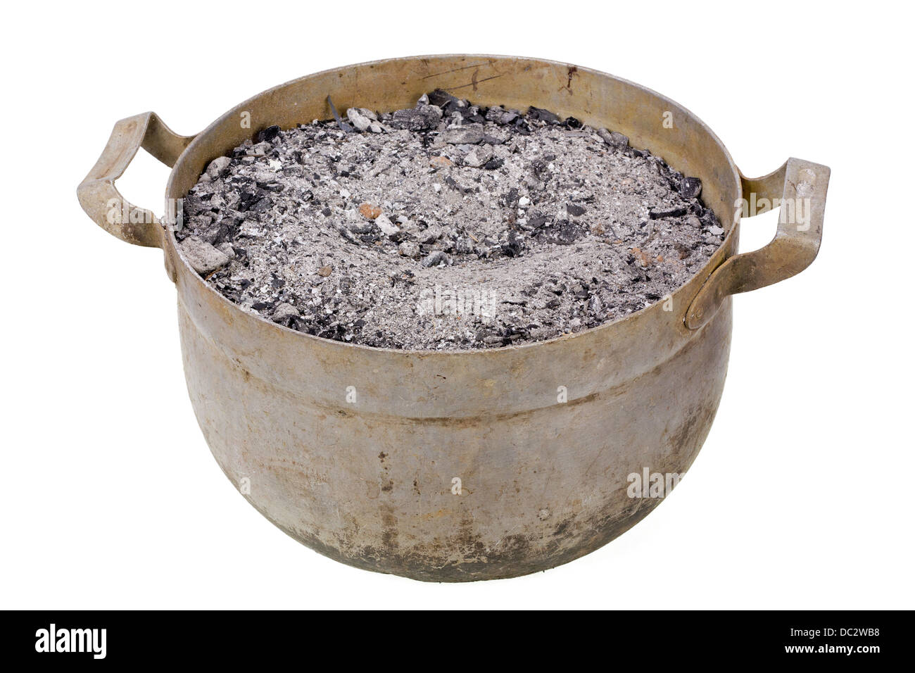 All people is dust concept. The old aluminum pot with ash isolated Stock Photo