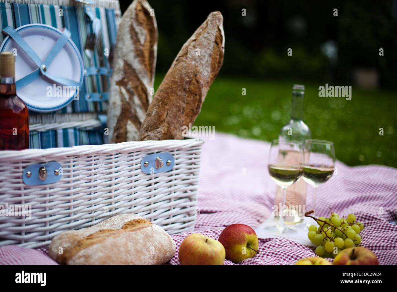 Picnic basket with fruit bread and wine Stock Photo - Alamy