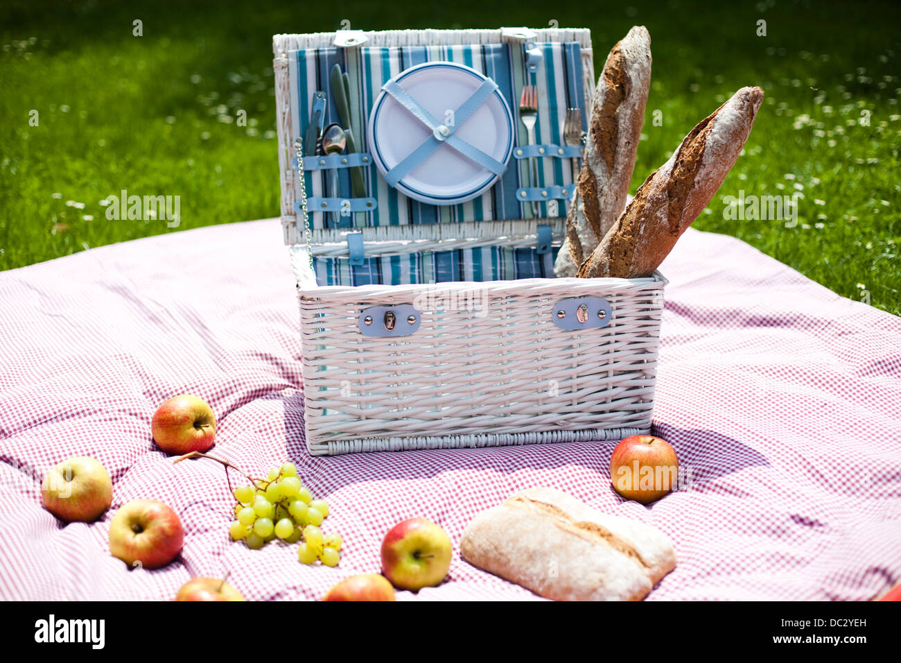Picnic basket with fruit bread and wine Stock Photo - Alamy