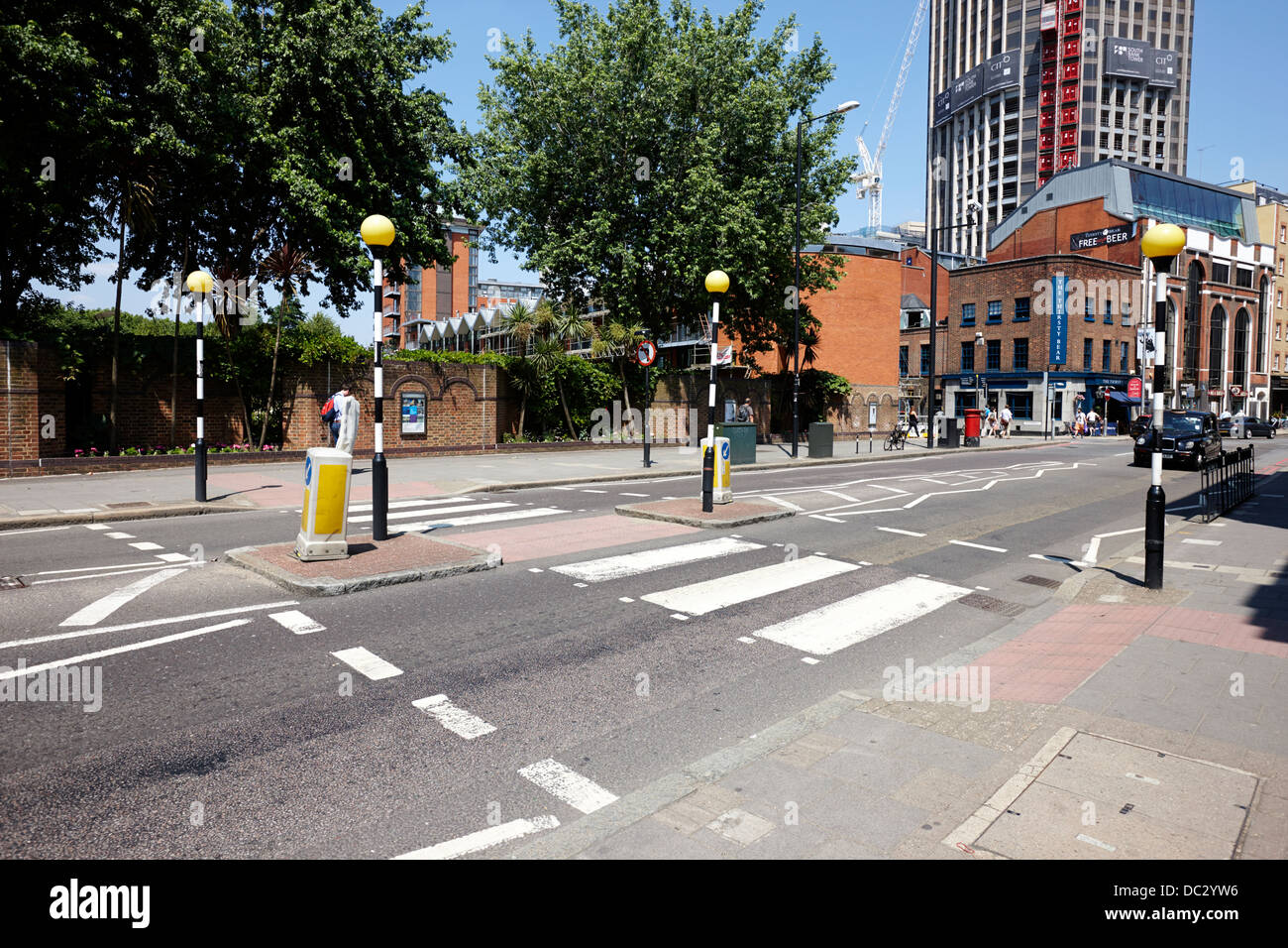 belisha beacon pedestrian crossing across road in central London England UK Stock Photo