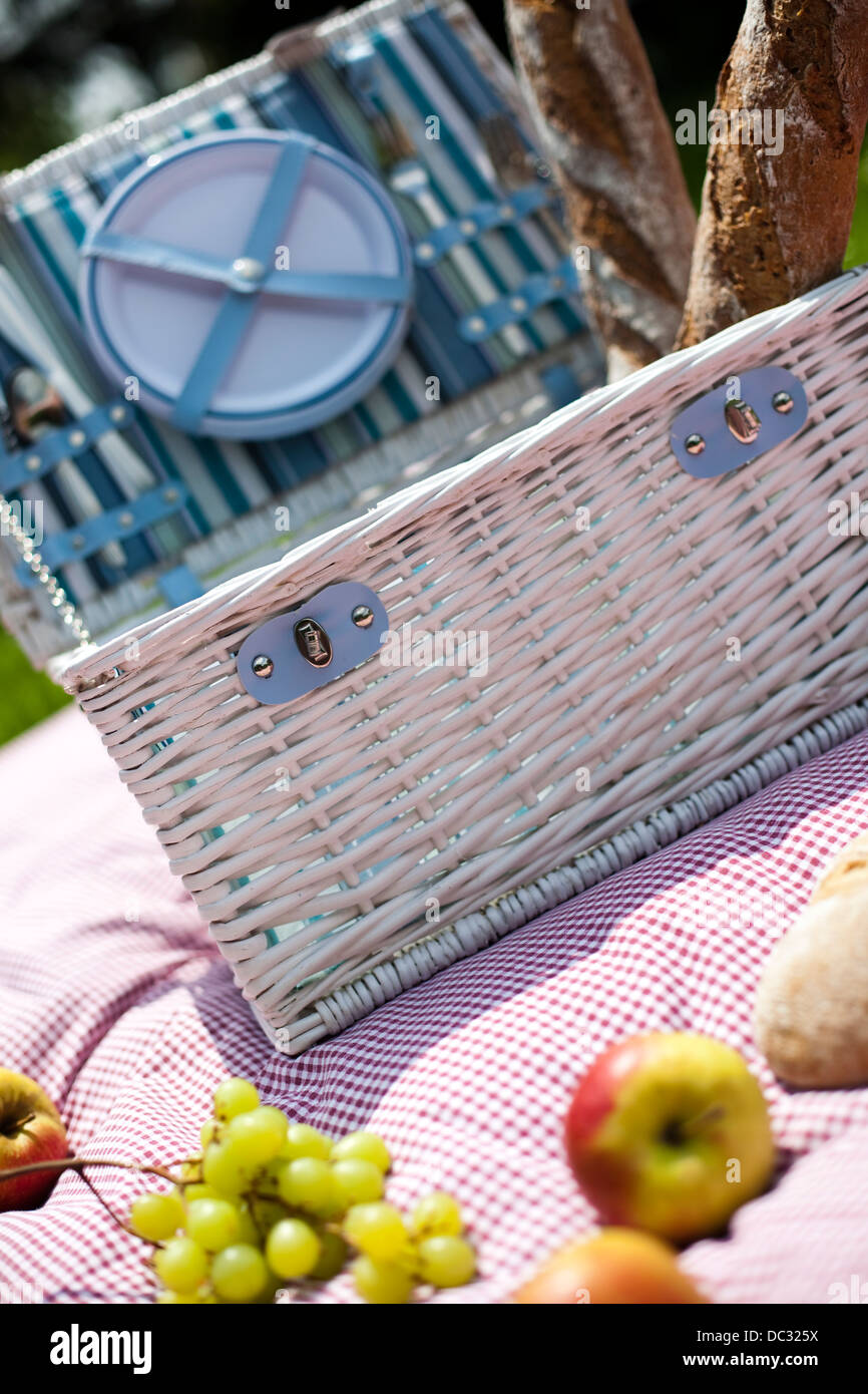 Picnic basket with fruit bread and wine Stock Photo - Alamy