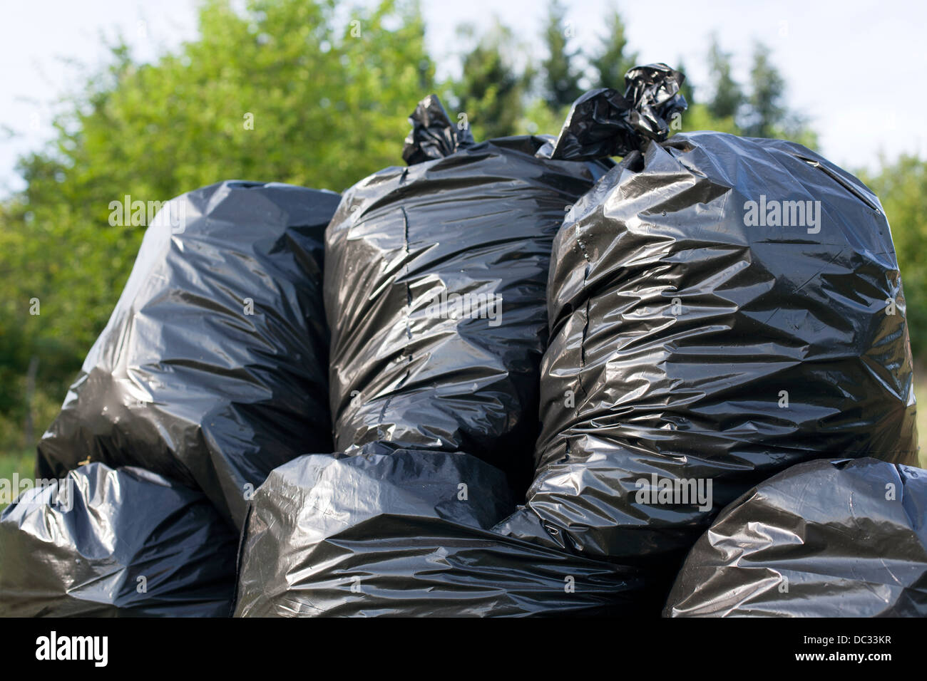 A pile of black garbage plastic bags Stock Photo - Alamy