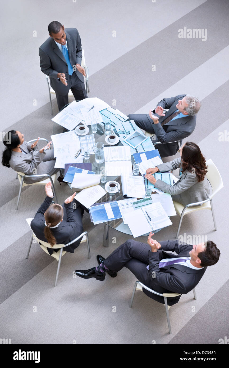 High angle view of businessman leading meeting Stock Photo