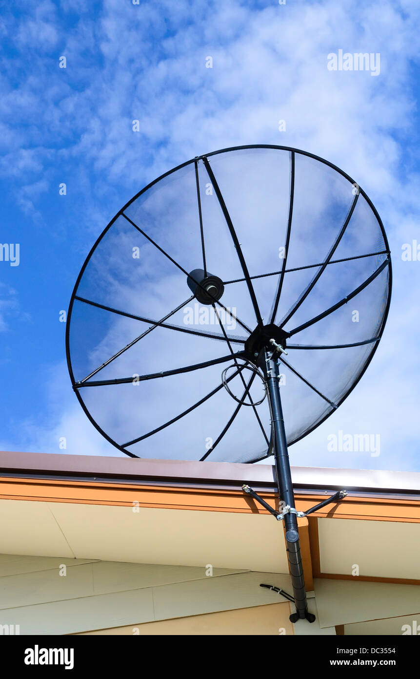Satellite dish and blue sky Stock Photo Alamy