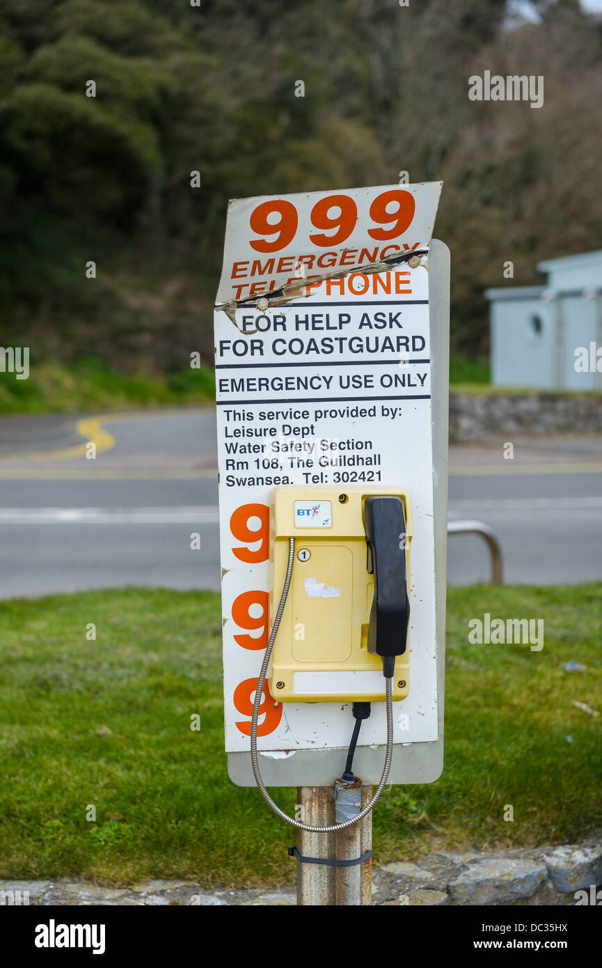 A Coastguard 999 Emergency Telephone at Caswell Bay near Swansea, South Wales. Stock Photo