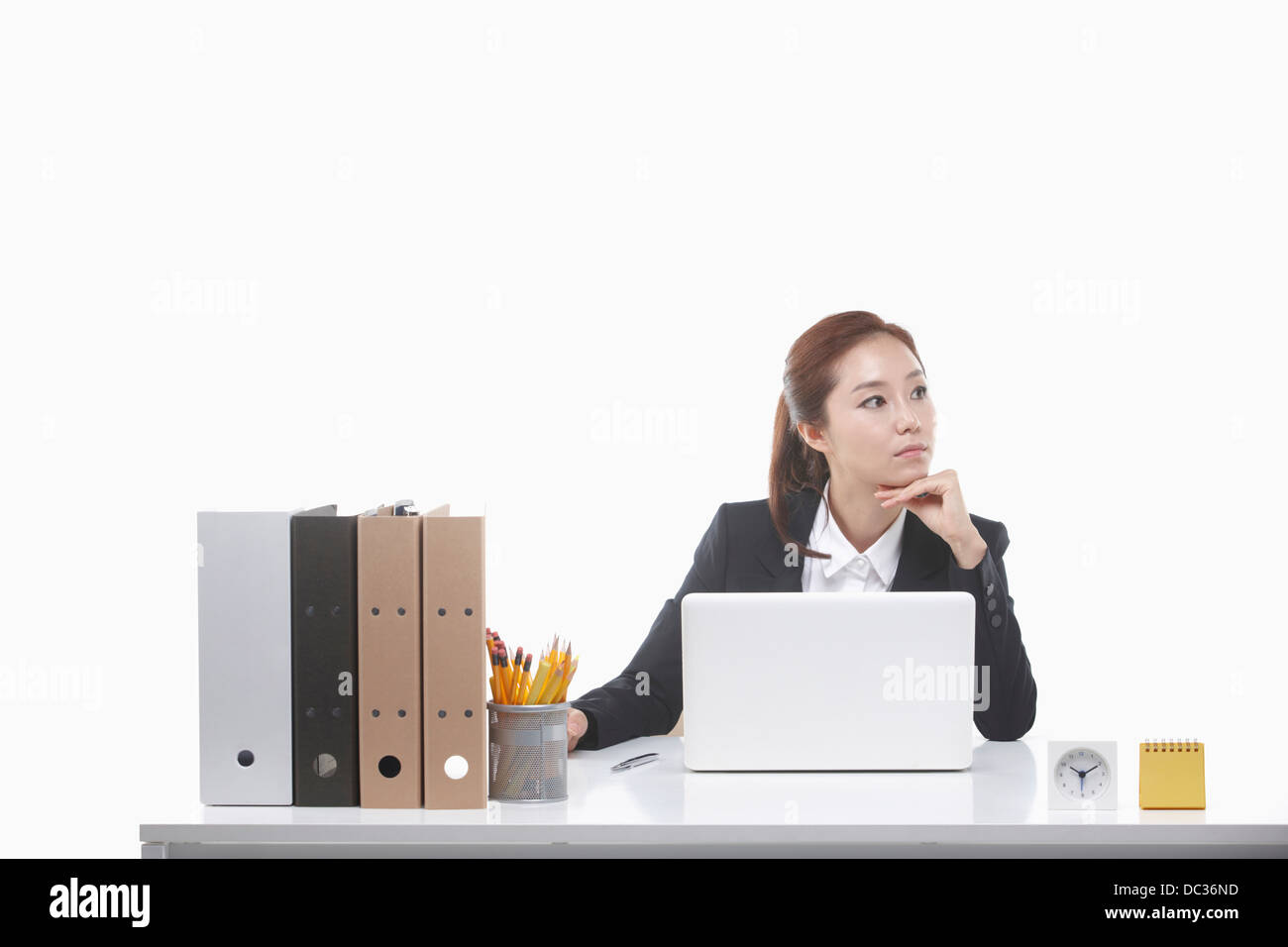 a businesswoman working with laptop at office desk Stock Photo - Alamy