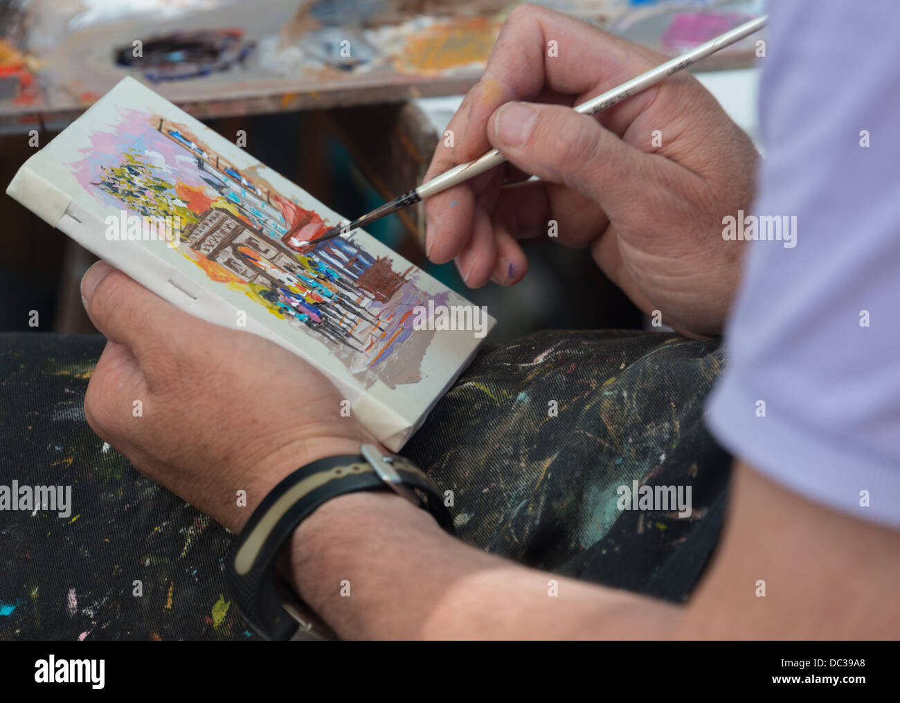 Artist at work in PLace du Tertre, Montmartre, Paris, France Stock Photo