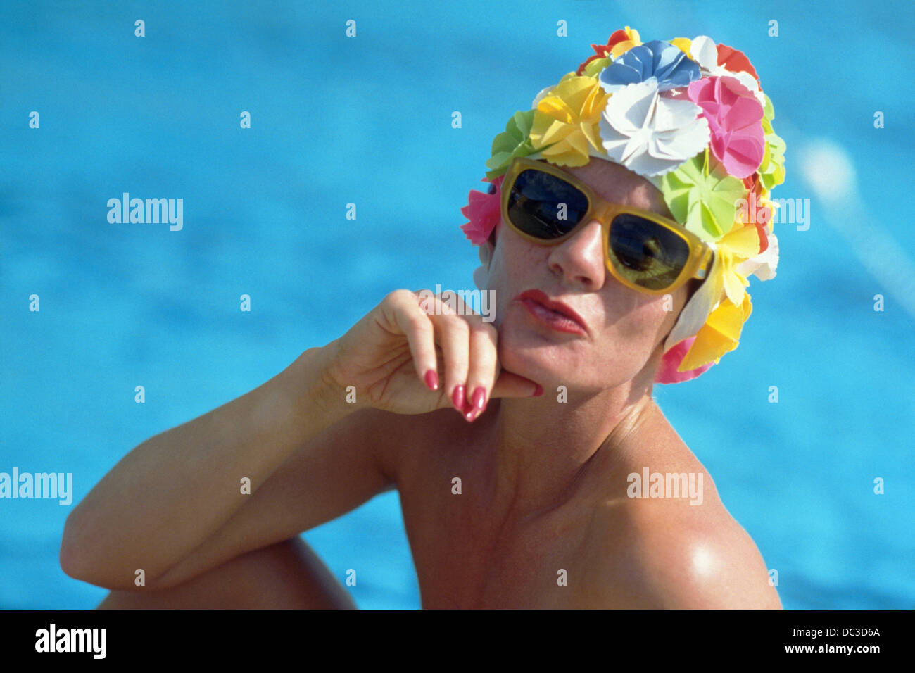 Female portrait in floral swim cap Stock Photo - Alamy