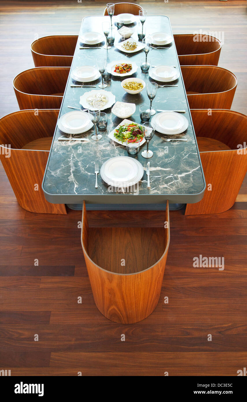 Placesettings and food on luxury table Stock Photo