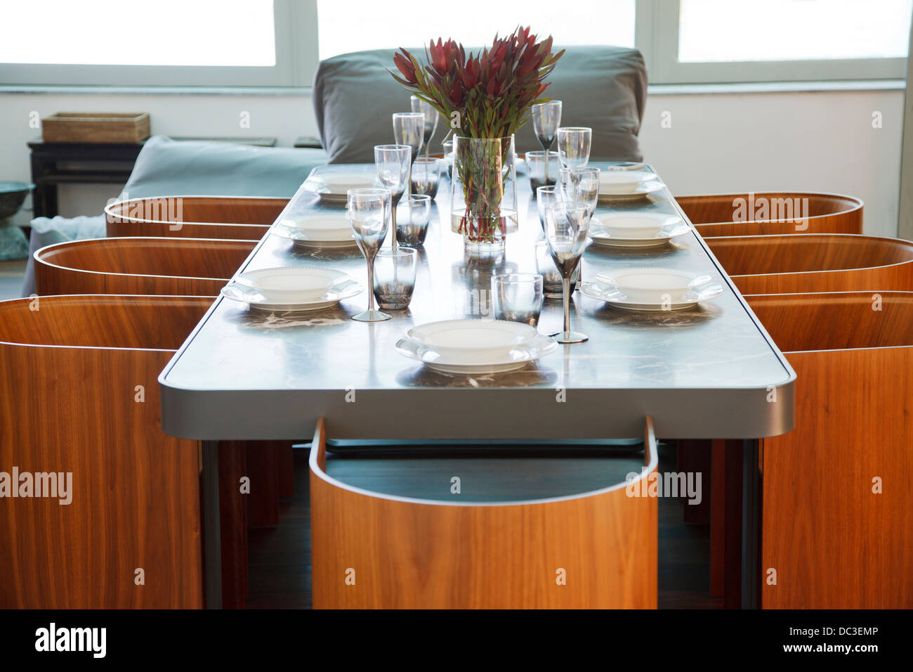 Place settings on table in luxury dining room Stock Photo