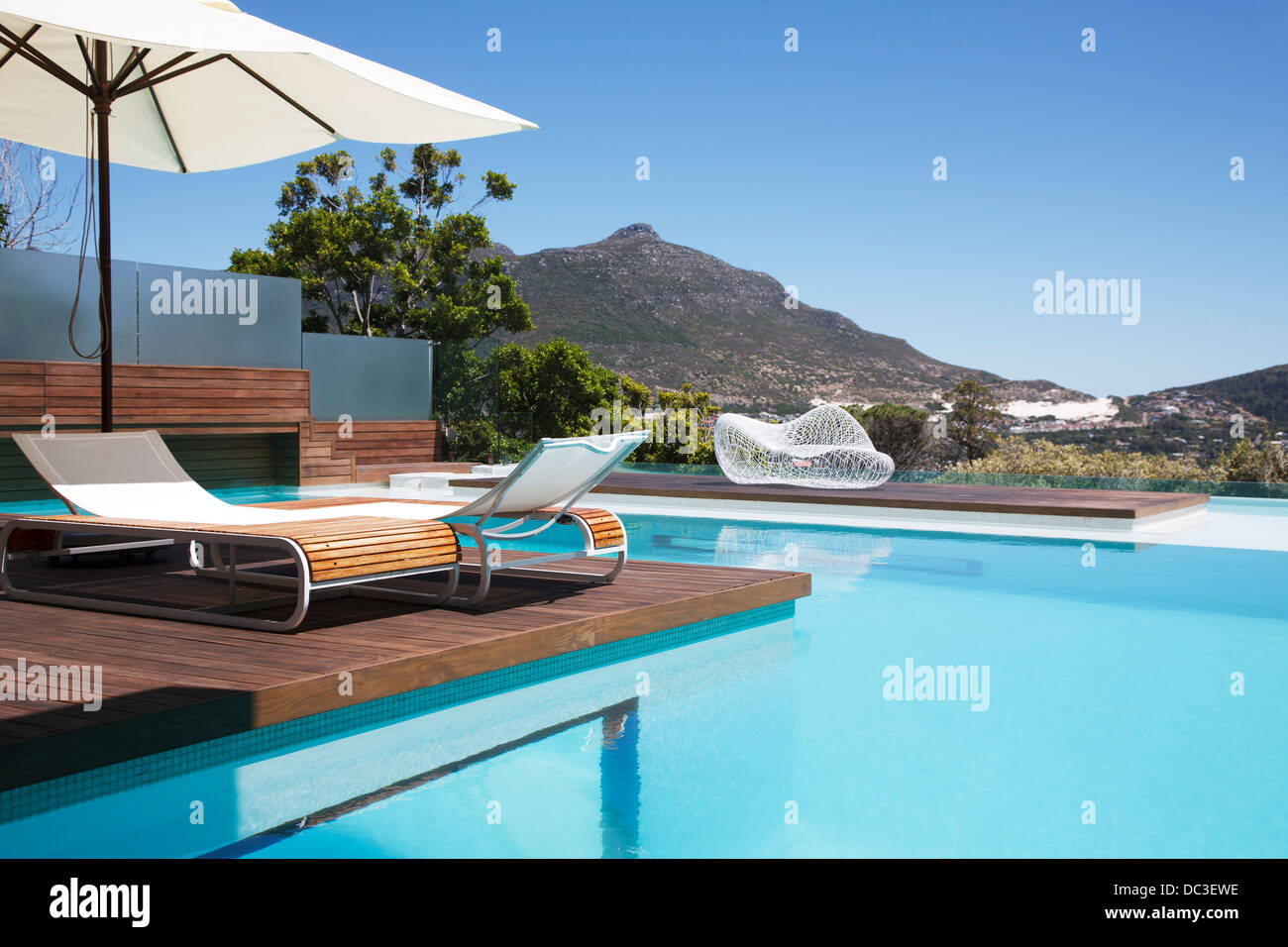 Luxury swimming pool with mountain view Stock Photo