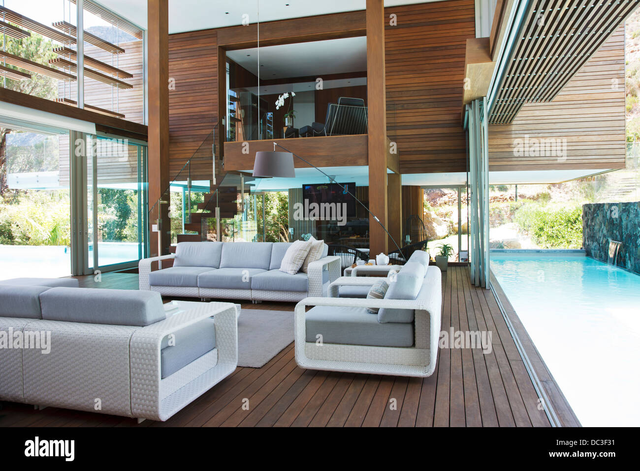 Lap pool alongside modern living room Stock Photo