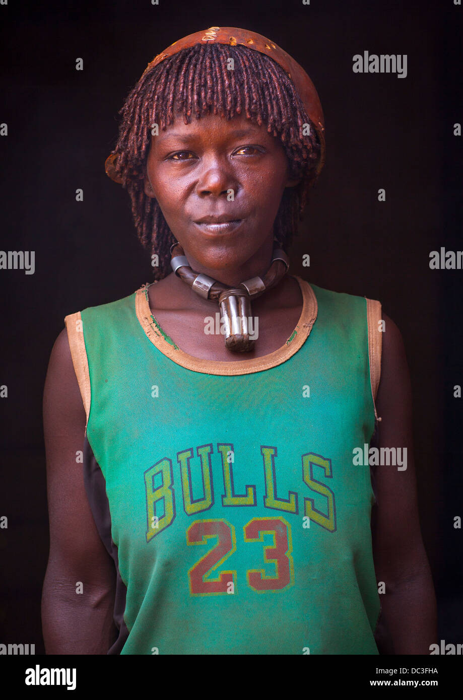 Bana Woman Wearing A Chicago Bulls Shirt, Key Afer, Omo Valley, Ethiopia Stock Photo