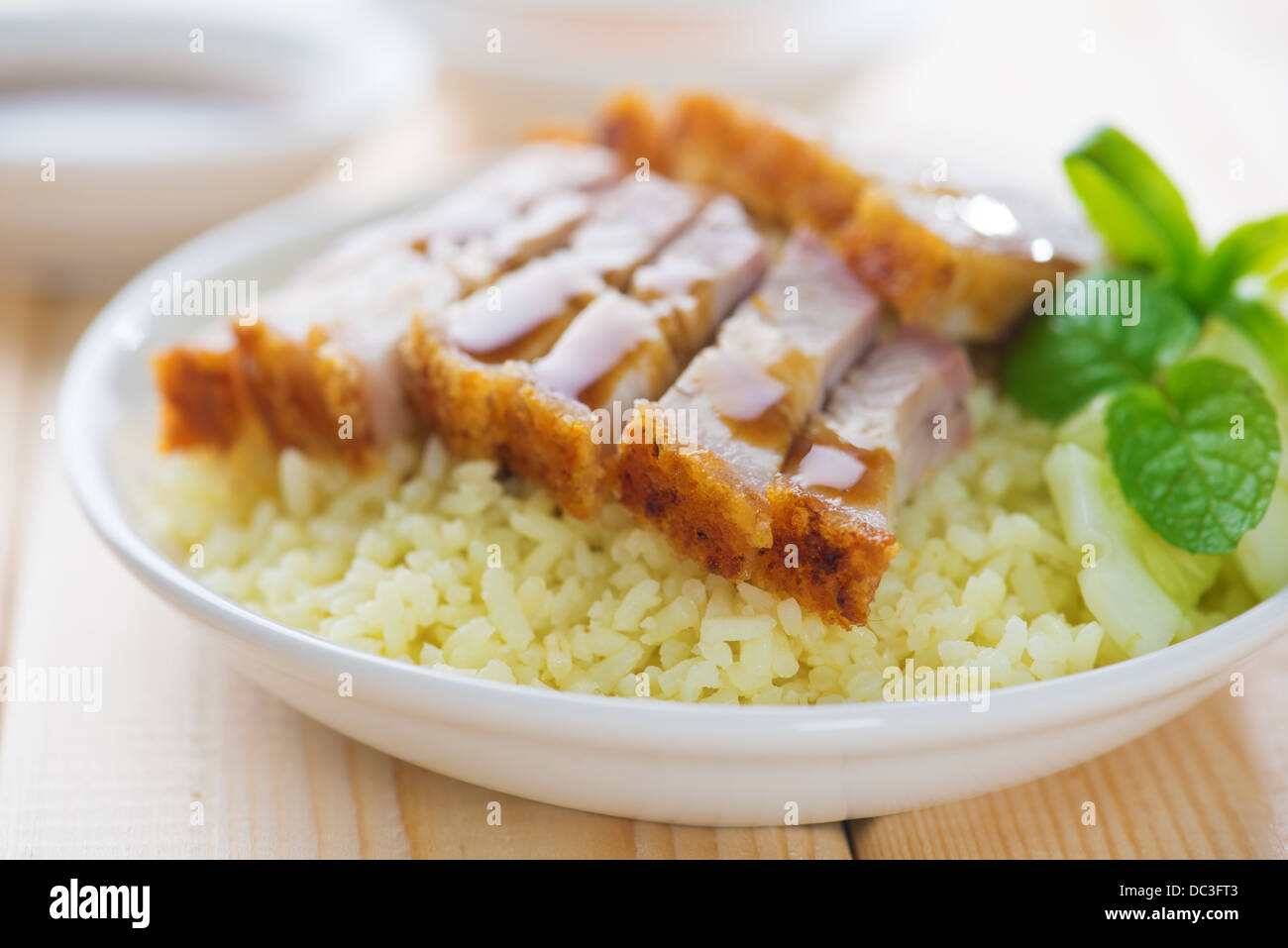 Siu Yuk - Chinese crispy roasted belly pork rice. Hong Kong cuisine. Stock Photo