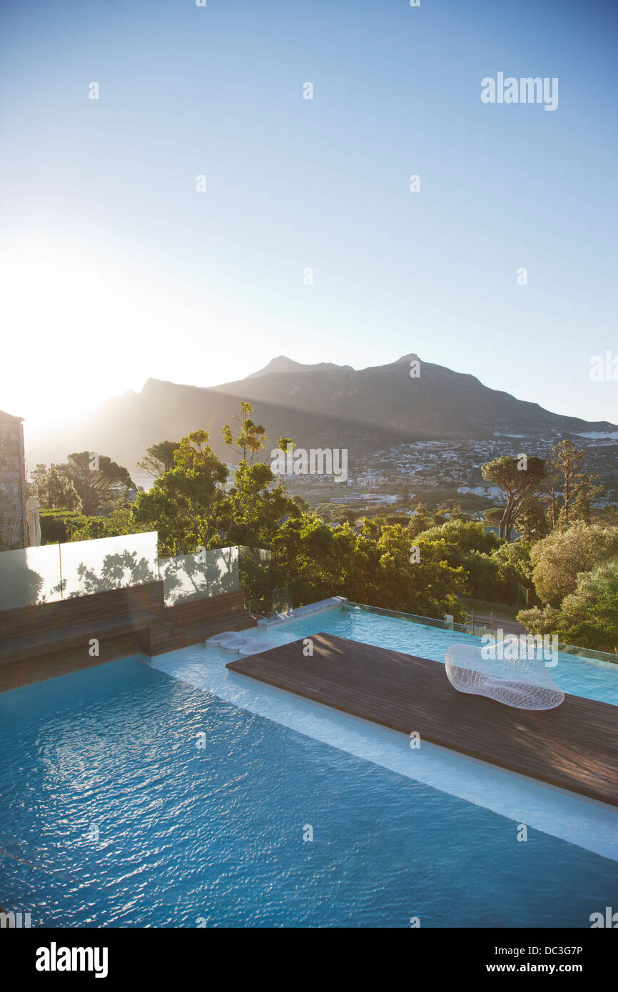 View of luxury swimming pool and mountains Stock Photo