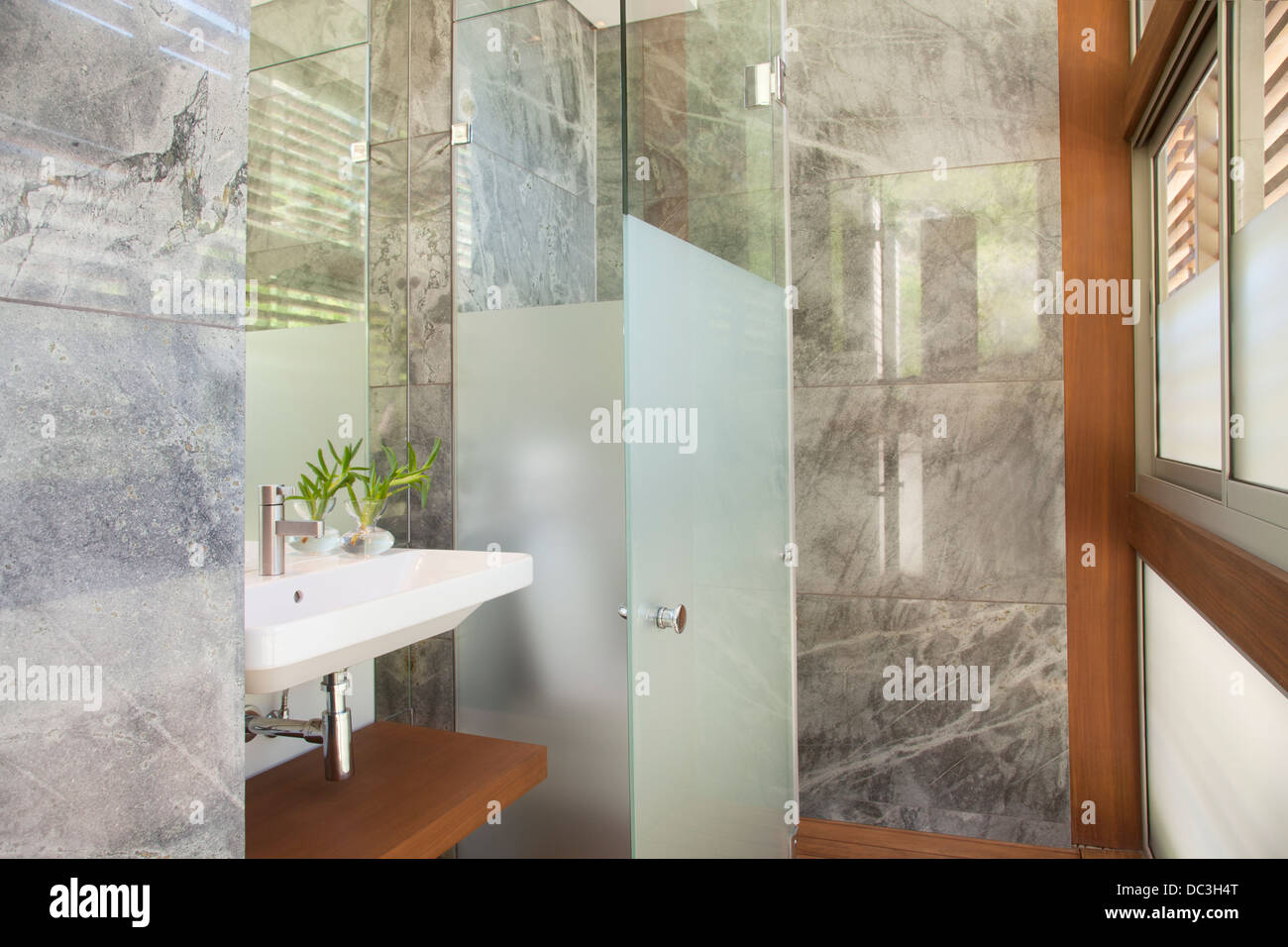 Modern bathroom with marble shower Stock Photo