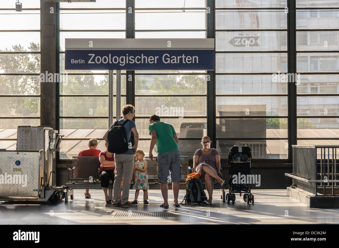 Passengers waiting at Berlin Zoologischer Garten (Bahnhof Zoo) railway station - Berlin Germany Stock Photo