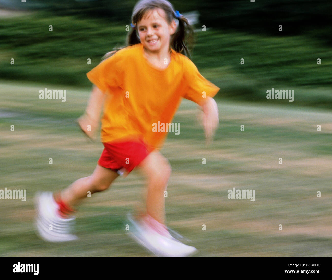 Young girl running Stock Photo Alamy