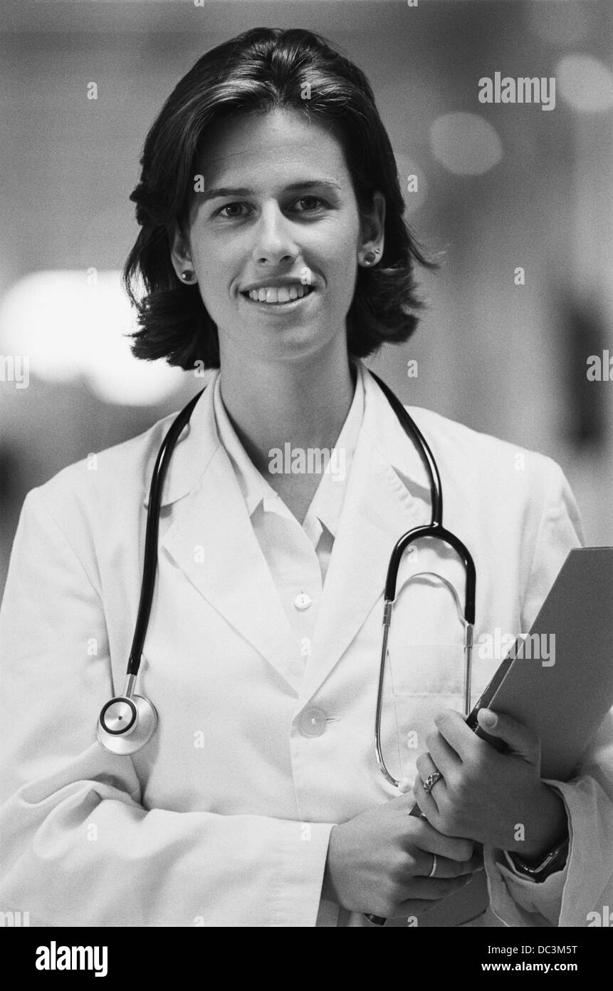 Doctor standing hospital Black and White Stock Photos & Images - Alamy