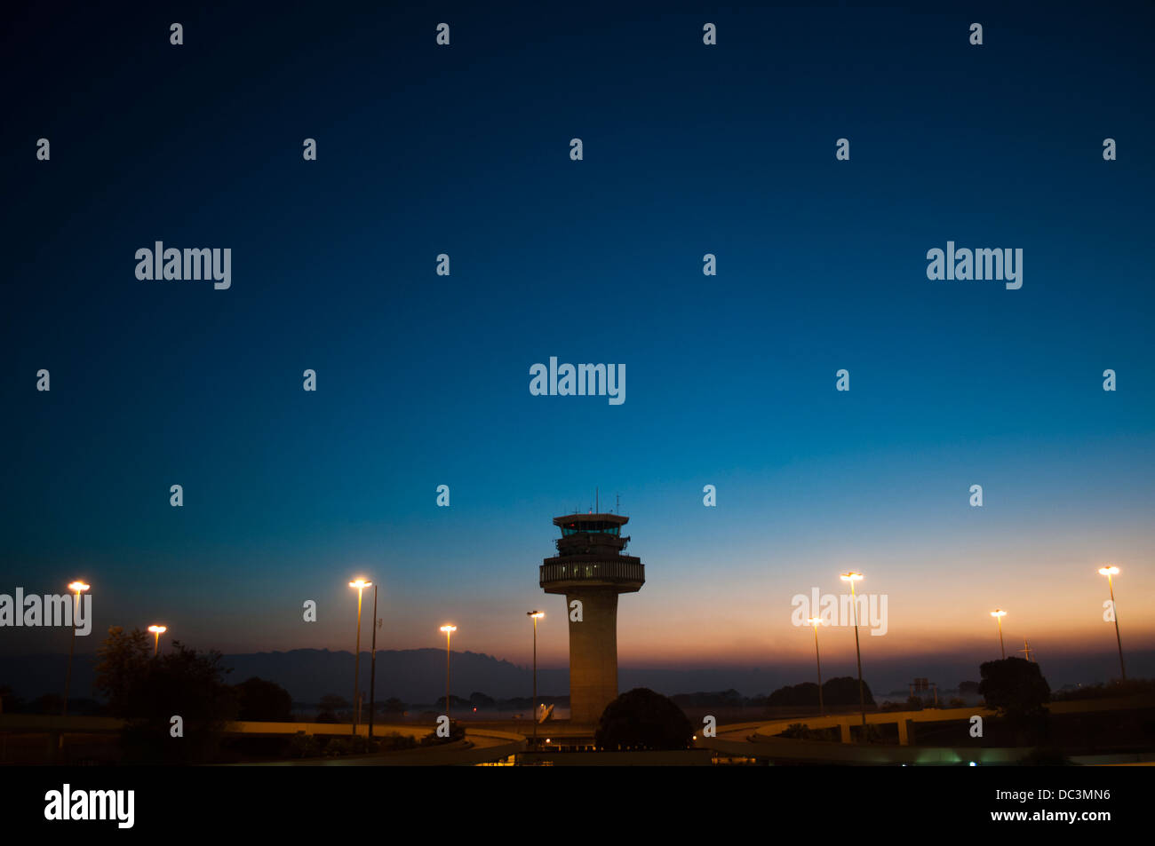 Galeão international airport Antonio Carlos Jobim command tower in Rio de Janeiro, Brazil, dusk light Stock Photo