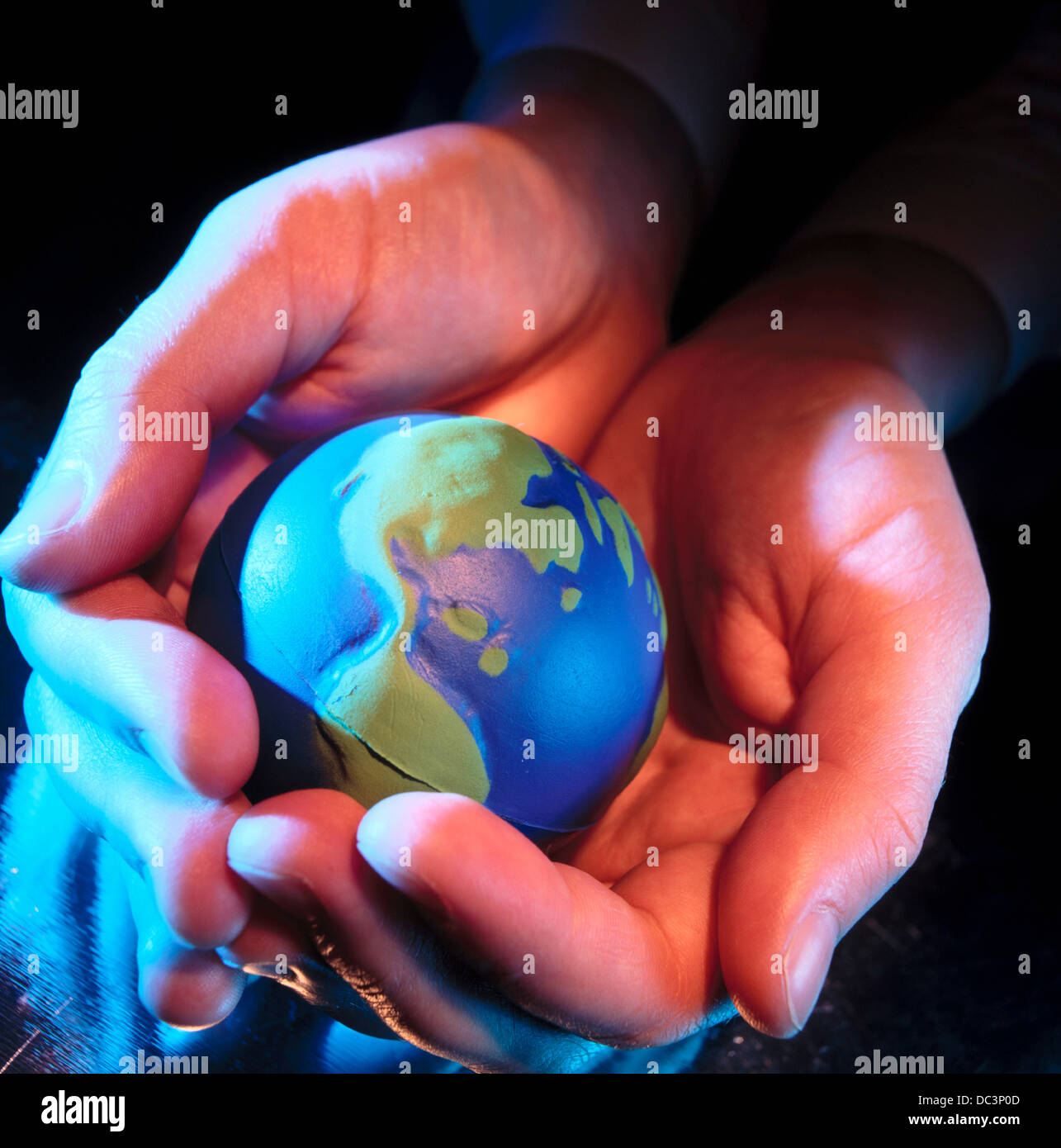 hand holding the world Stock Photo - Alamy