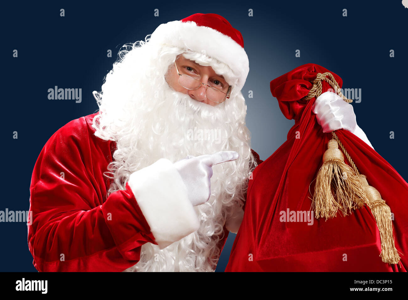 santa claus with his gift bag Stock Photo - Alamy