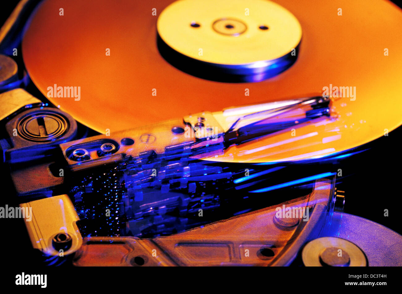 Hard disk, showing head assembly and platters/disks Stock Photo Alamy