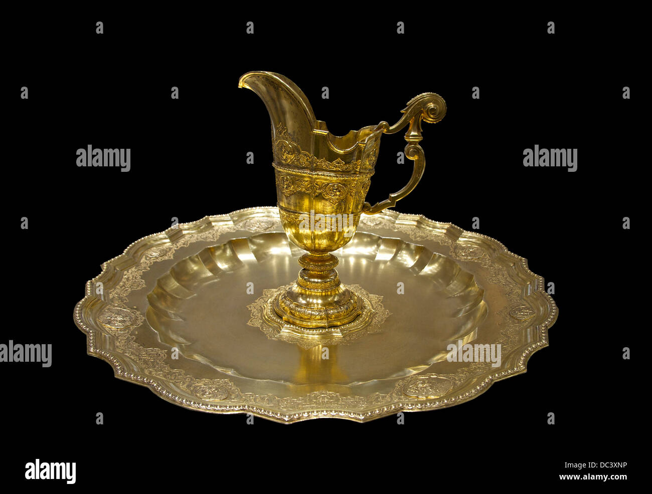 A gilt ewer on a golden platter that belonged to the Empress Maria-Theresia, Silberkammer, Hofburg palace, Vienna, Austria. Stock Photo