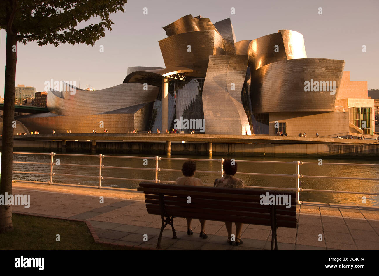 Old Ladies Sitting On Bench Opposite Guggenheim Museum Of Modern